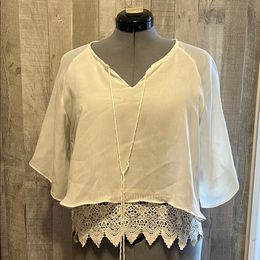 Elegant White Blouse with Lace Hem